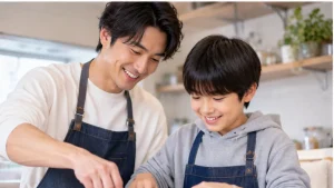 父親と息子が一緒に料理を楽しむイメージ